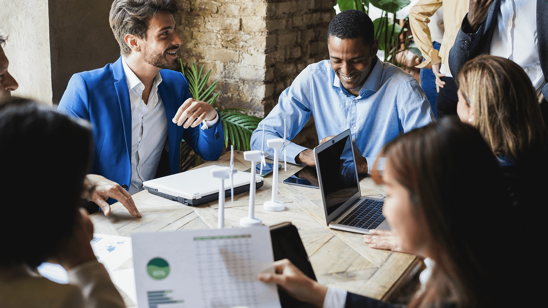 Colleagues around a meeting table